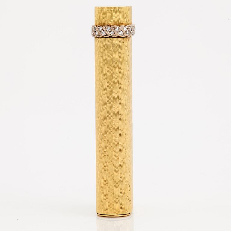 A cigarette lighter by Cartier set with single cut diamonds.