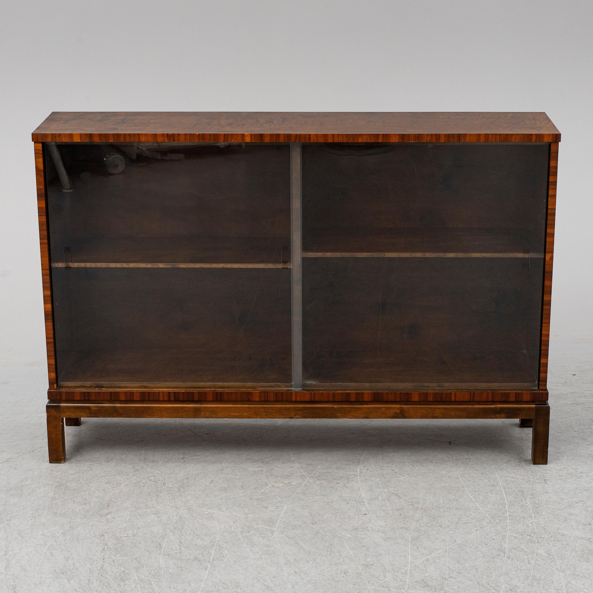 A stained birch veneered bookcase, 1930's.