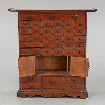 A contemporary Chinese spice cupboard.