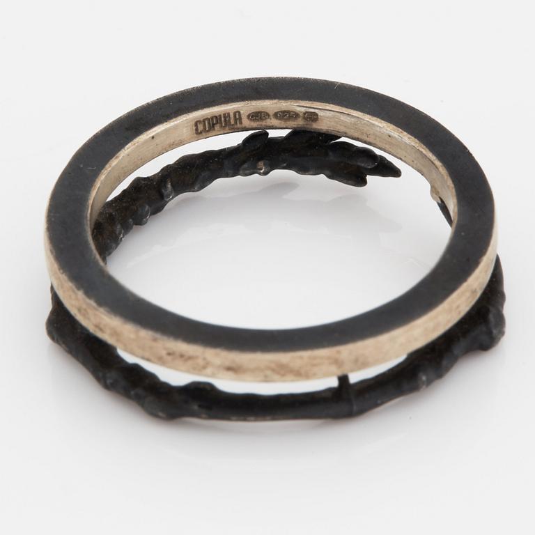 Copula, silver, två armband och en ring.