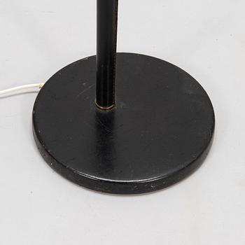 Alvar Aalto, an 'Angel's Wing' floor lamp. Manufactured by Valaistustyö.