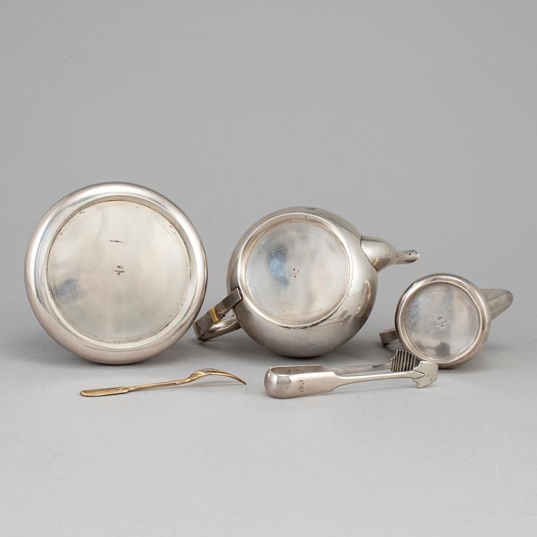 A Russian early 20th century parcel-gilt silver 5 piece tea-set, mark of Grachev, St. Petersburg 1908-1917.
