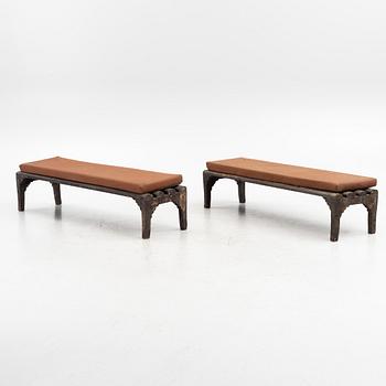 A pair of painted benches, circa 1900.