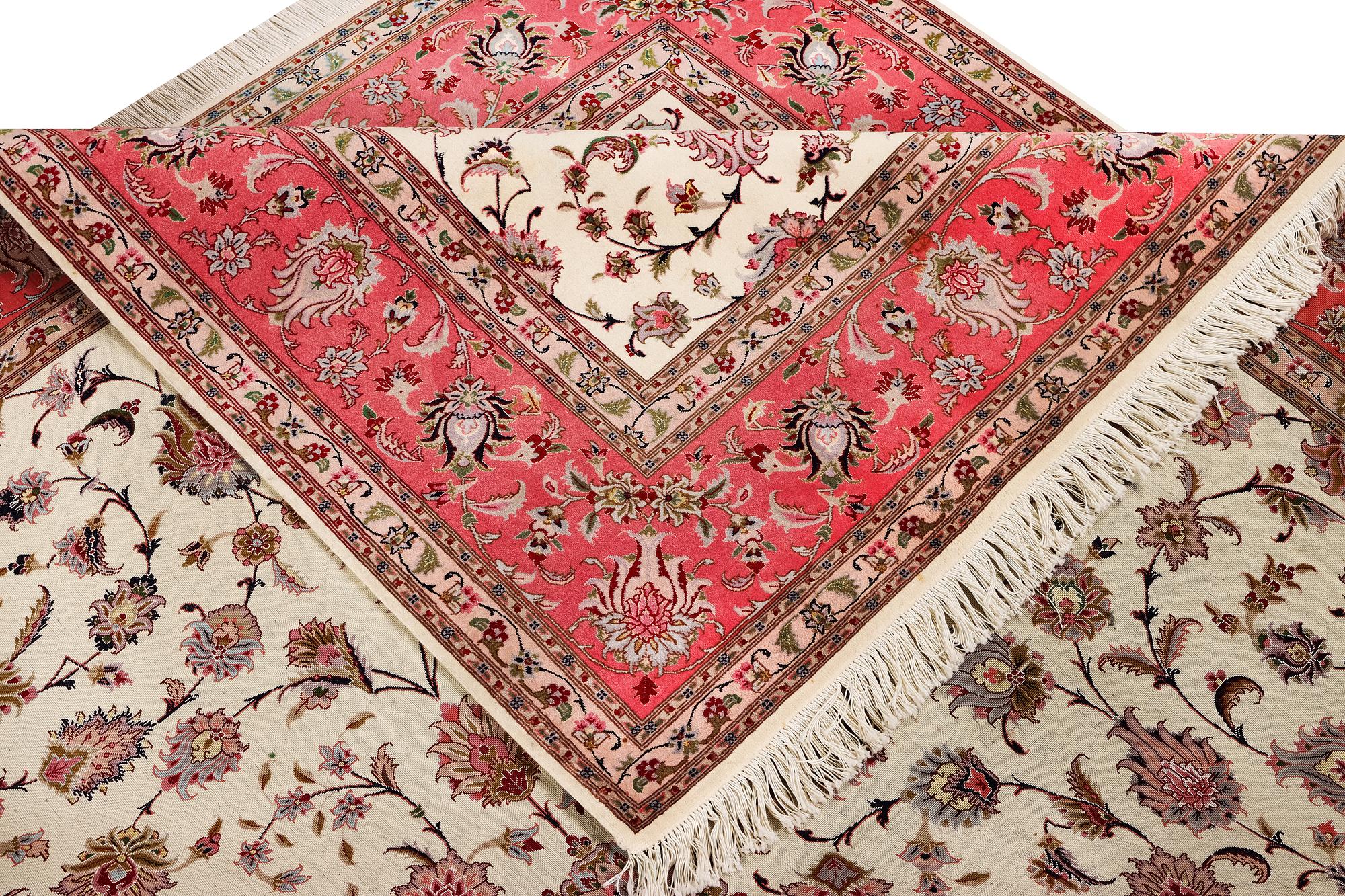 An old Tabriz carpet, part silk, 60 raj, c. 253 x 250 cm.
