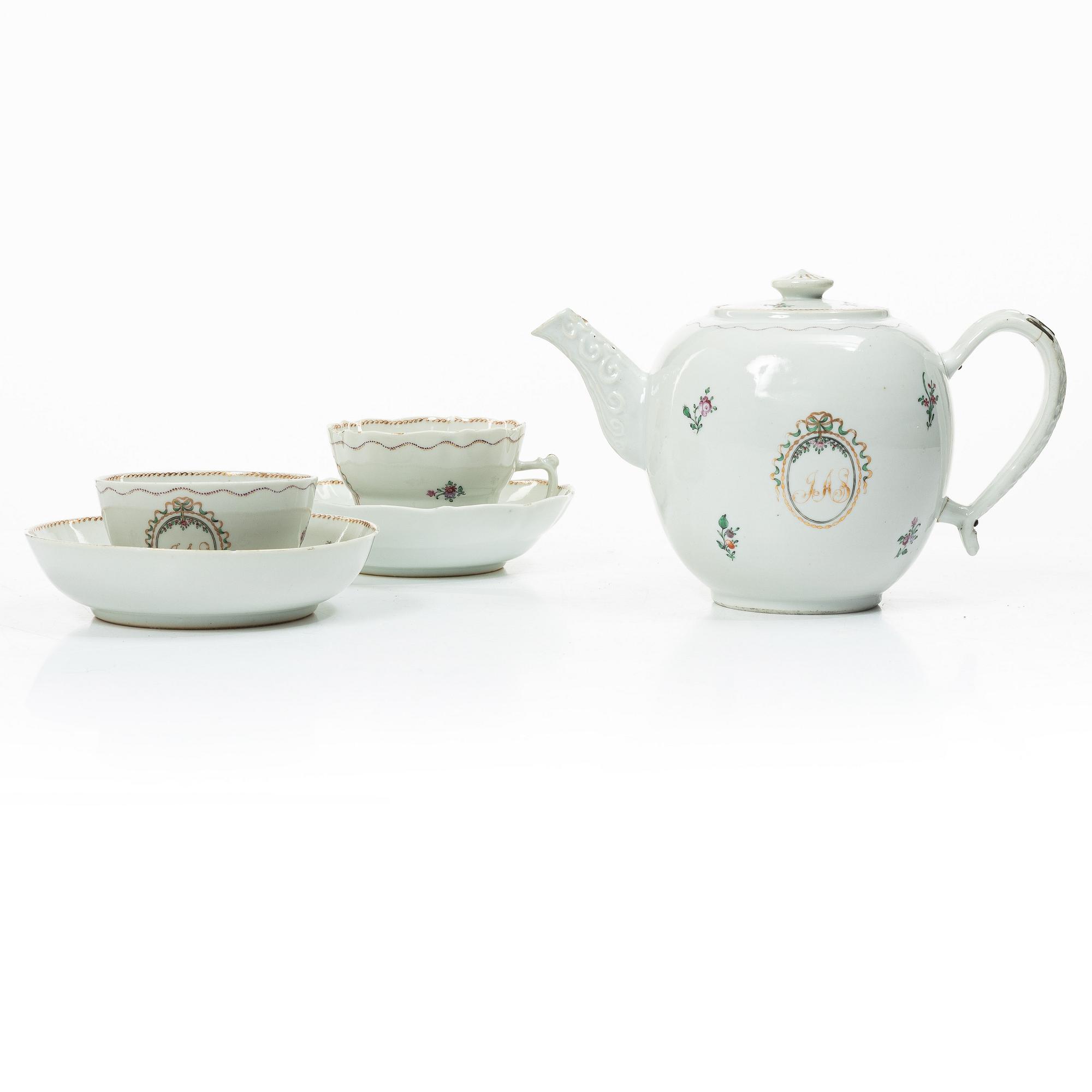 Cups and saucers, 11+7, and a teapot in famille rose with monogram, company porcelain, China, 18th century.