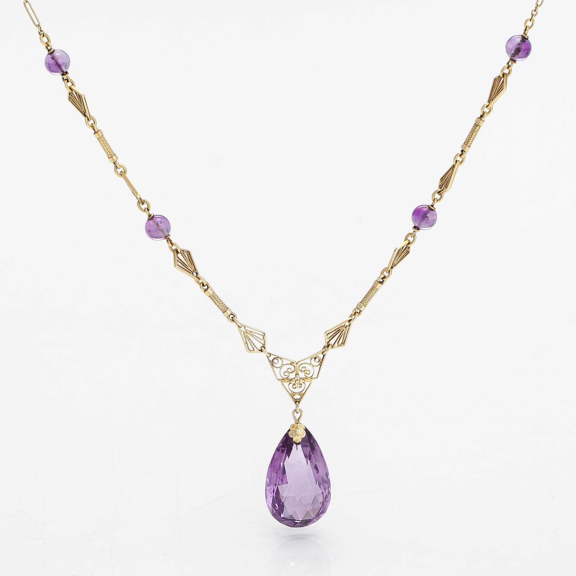 A 14K gold and amethyst neckalce.