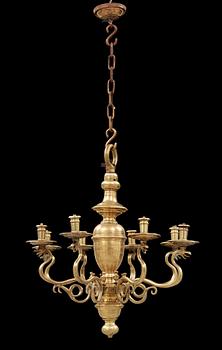A 19th century eight-light brass chandelier in the manner of Hans Rogiers van Harelbeke.