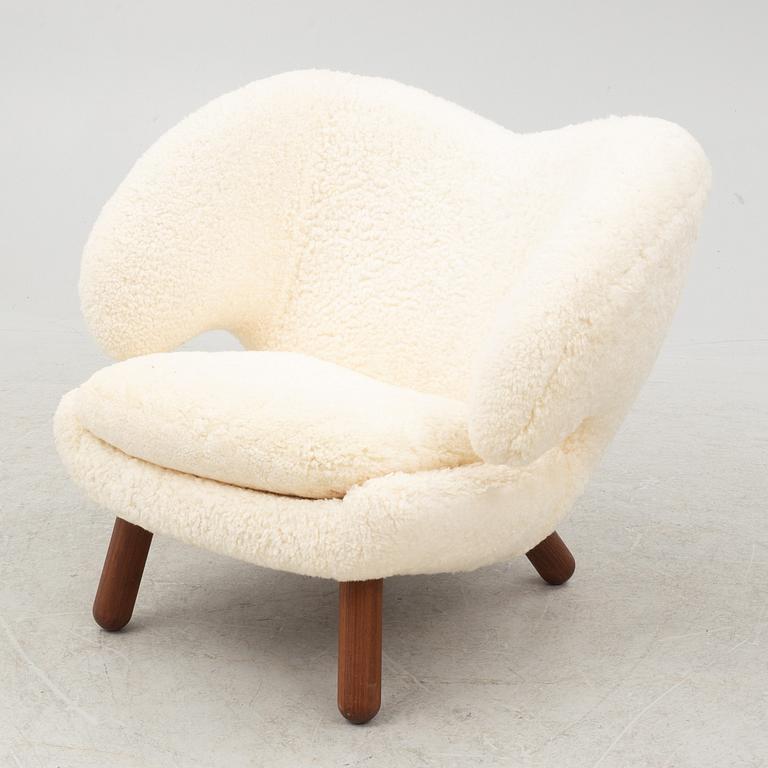 Finn Juhl, a' Pelican Chair' armchair, House of Finn Juhl, Denmark.