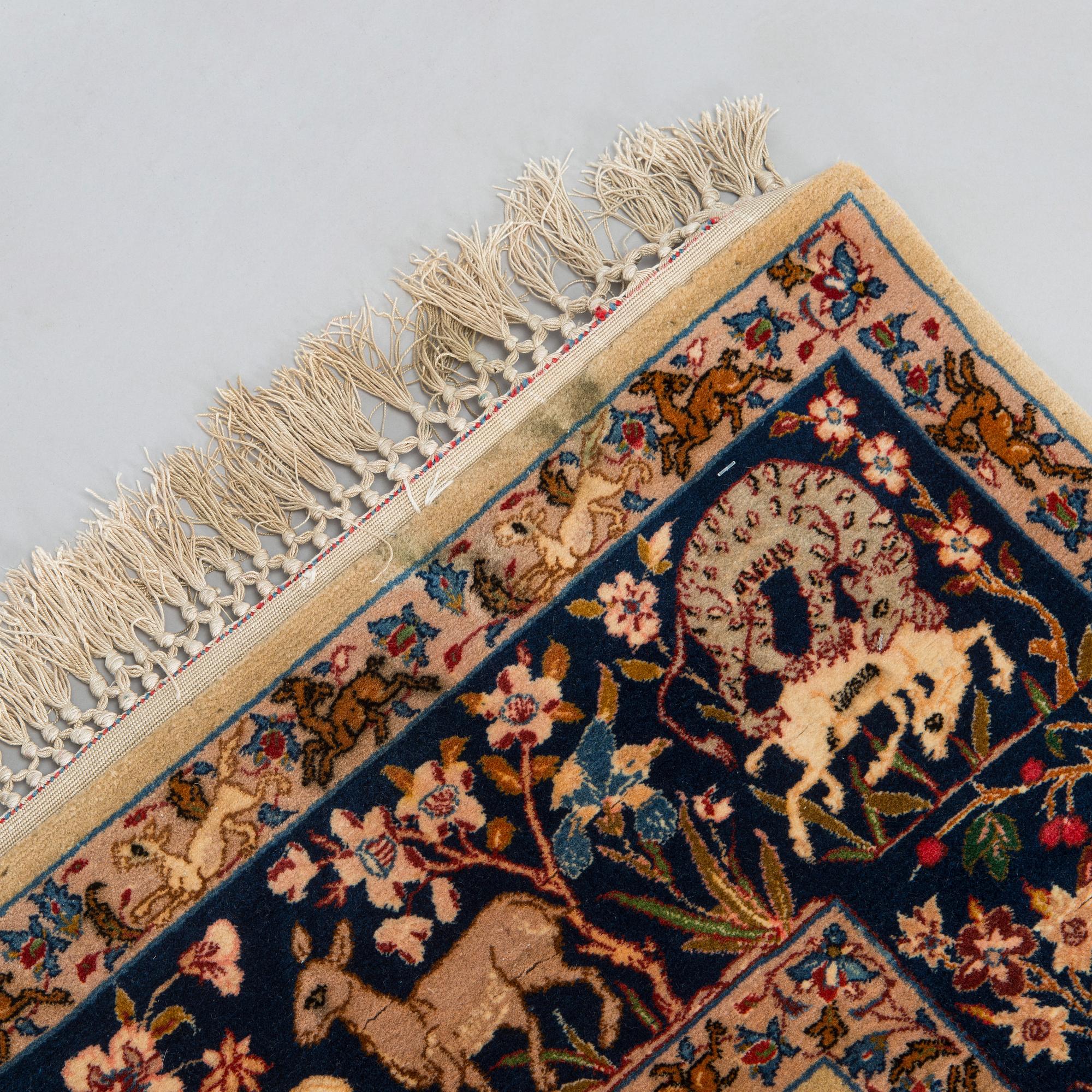 A semi-antique Isfahan rug, central Persia, approx. 243 x 151 cm.