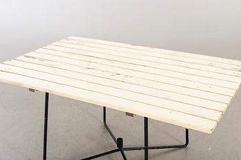 A GARDEN TABLE MID 20TH CENTURY.