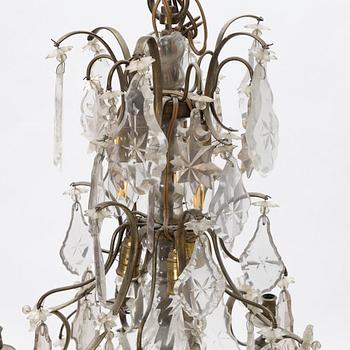 A six-light rococo-style chandelier, later part of the 20th century.