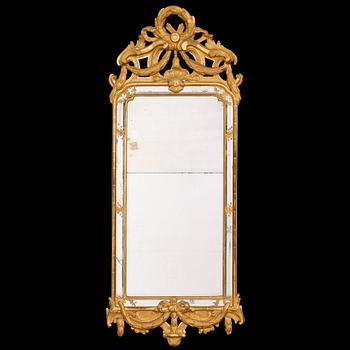 571. A Gustavian mirror by N Meunier dated 1774.