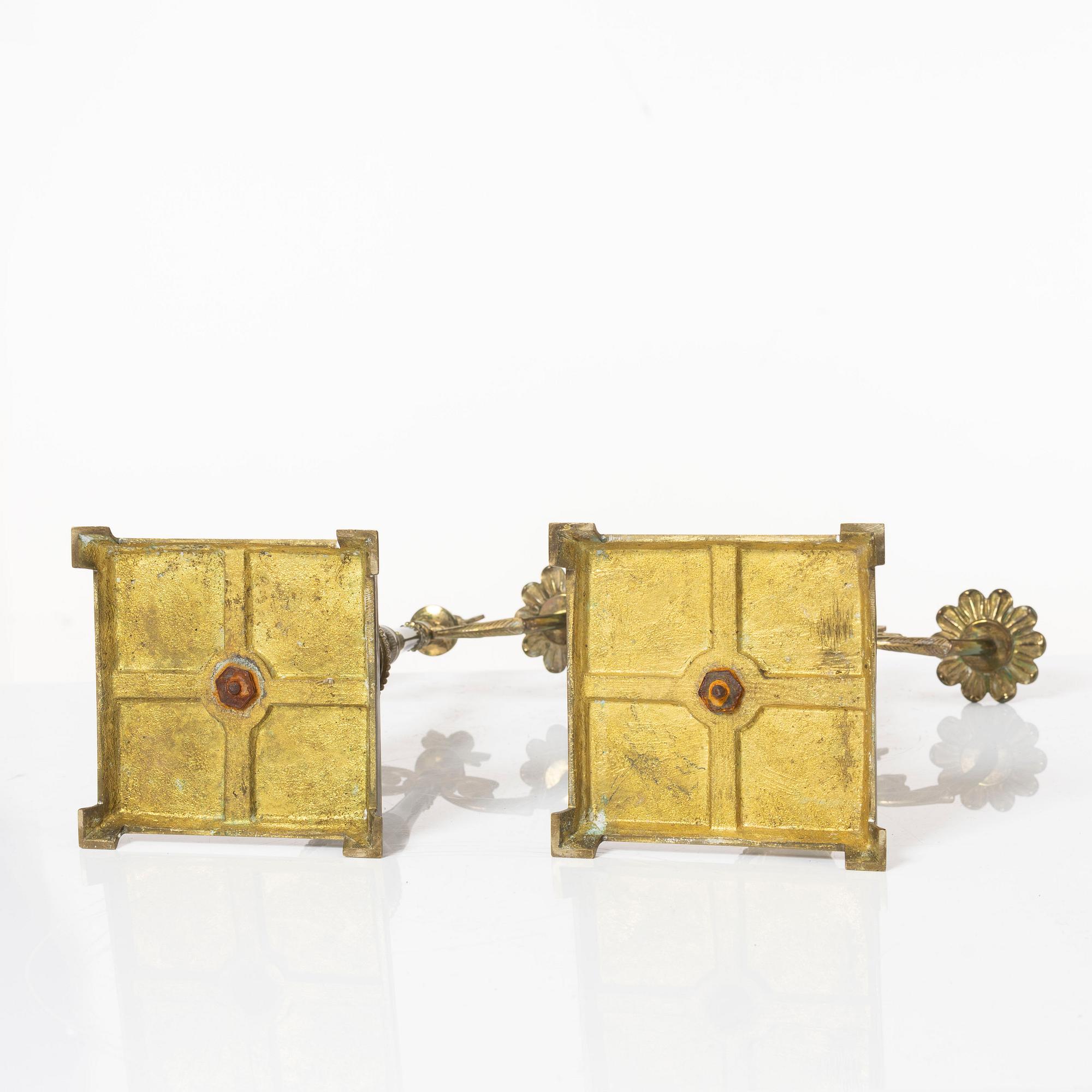 Candle holders, a pair of brass, Empire style, 20th century.