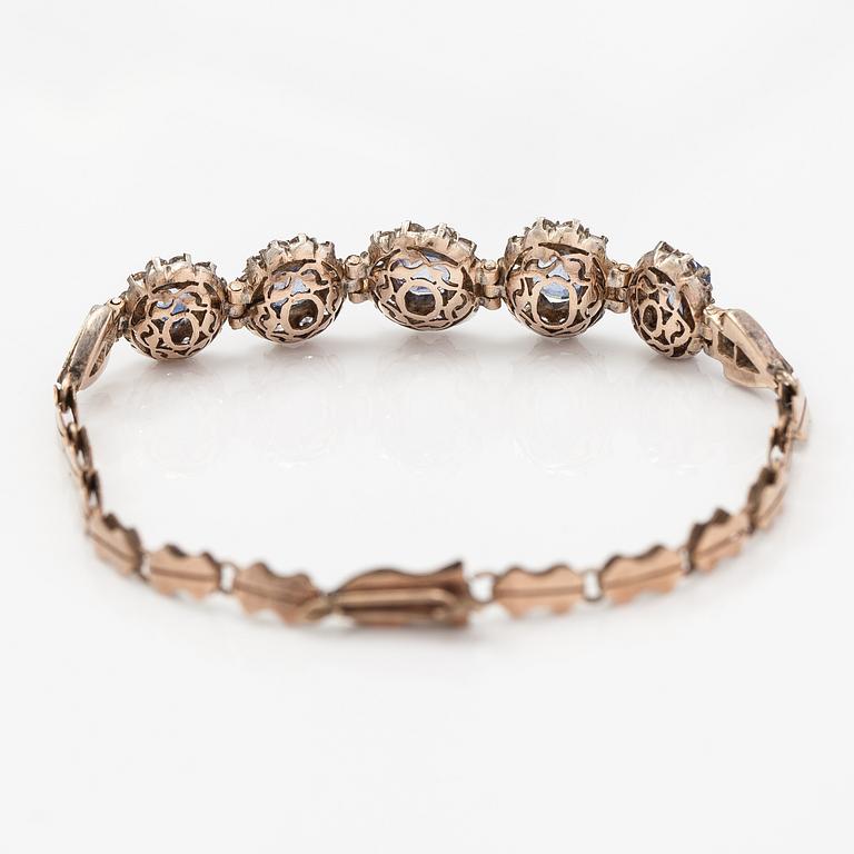 Armband, 4-8K guld, safirer.