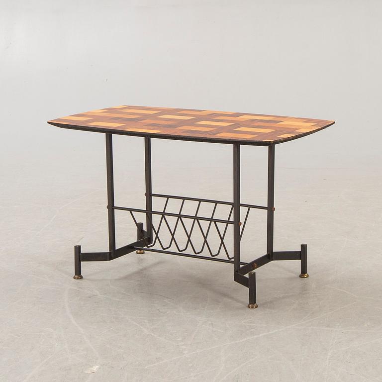 An Italian 1950s mahogany, walnut side table.