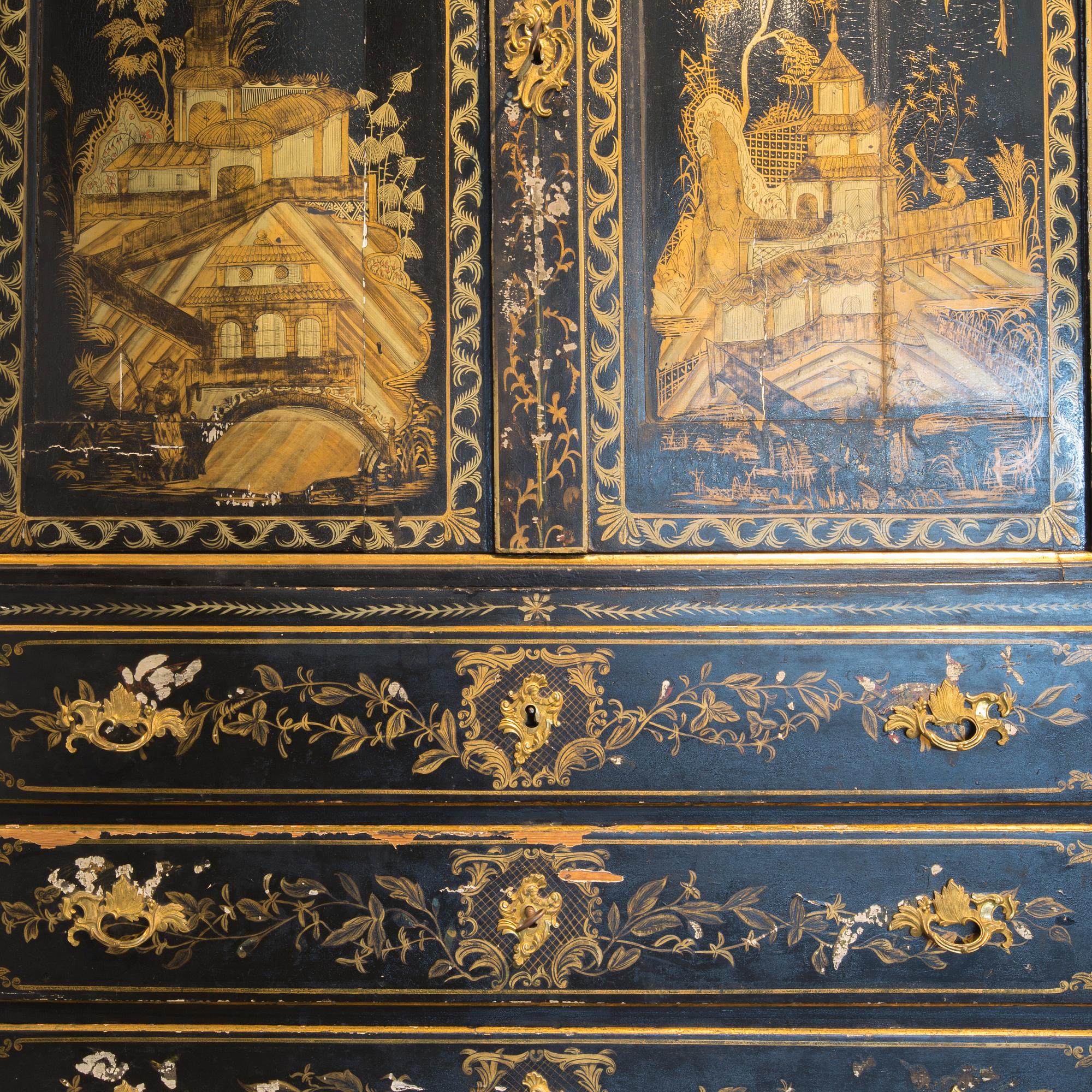An early 18th century Chinese style cupboard.