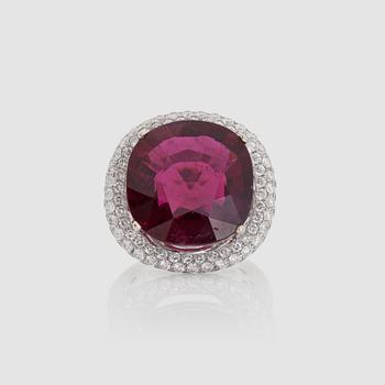 1295. A rubellite, 15.58 cts, and diamond, 1.69 cts, ring.