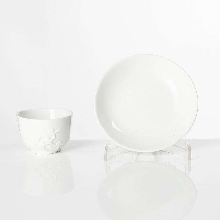 A blanc de Chine cup with saucer, Meissen, 18th century.
