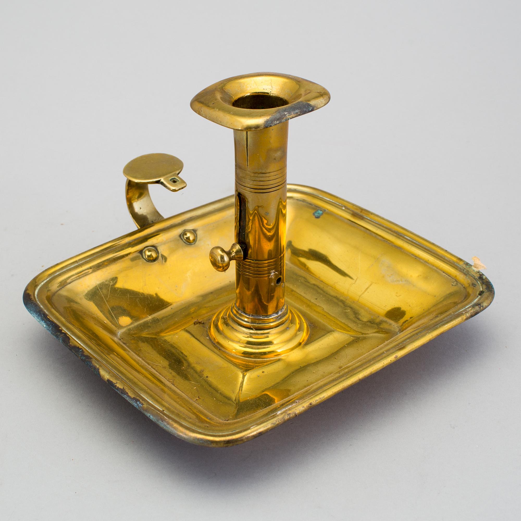 A 19th century brass candlestick.