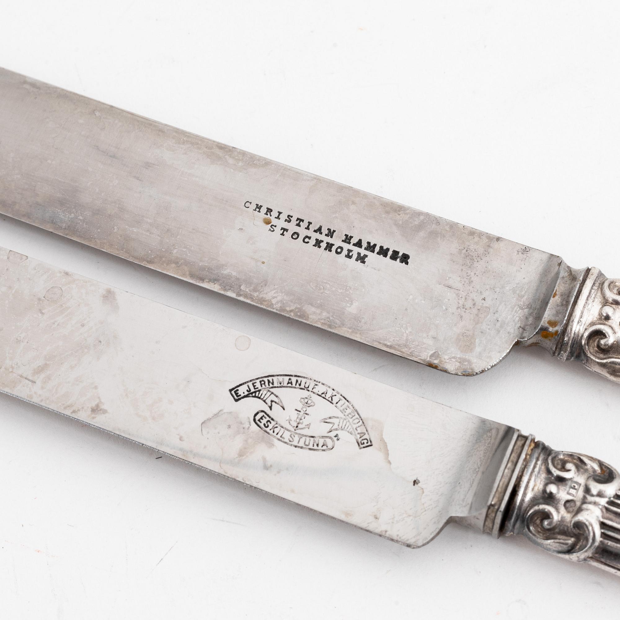 Twelve Swedish rococo-revival silver knives, mark of Christian Hammer, Stockholm 1857-1880.