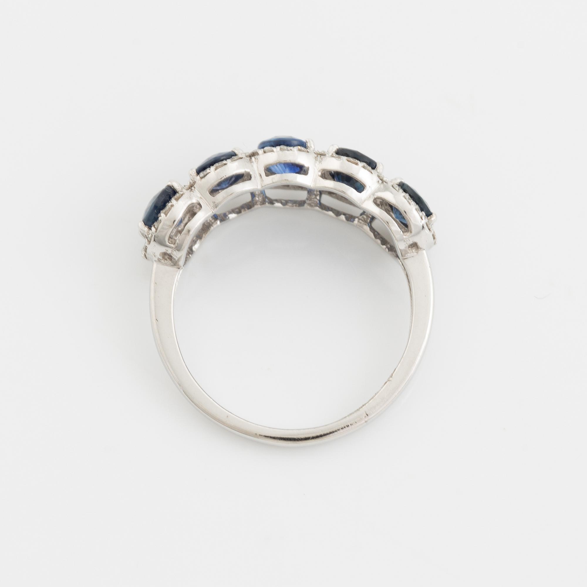 Oval sapphire and brilliant cut diamond ring.