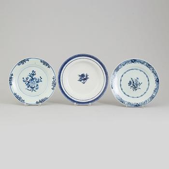 Two blue and white export porcelain plates and a soup plate, Qing dynasty, Qianlong (1736-95).