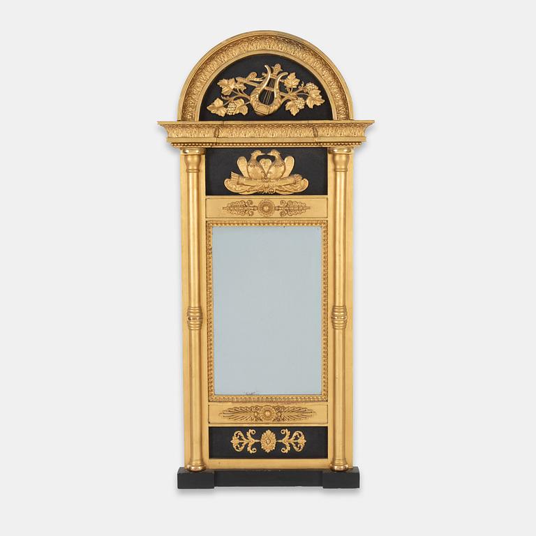 A Swedish Empire mirror, first half of the 19th Century.