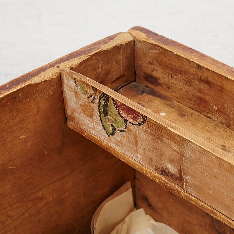 A painted chest, dated 1831.