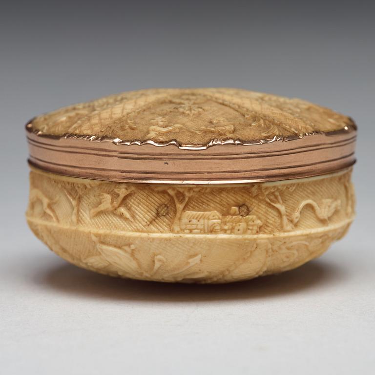 A 17th century bone and gold snuff-box.