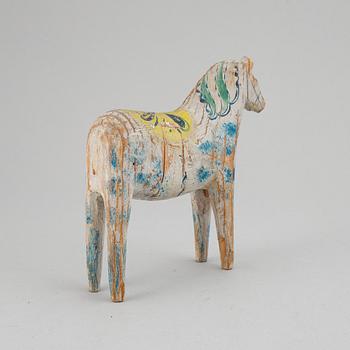 A painted Swedish wooden horse from the early 20th century.
