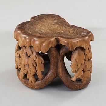 Knut Fjaestad, an Art Nouveau sculptured pine table/stool, Sweden ca 1900.