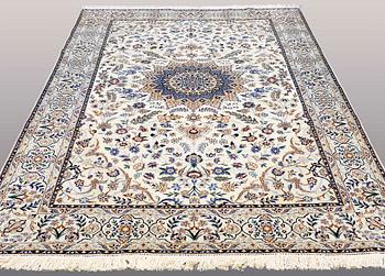 A CARPET, Nain part silk, so called 9 LAA, ca 307 x 210 cm.