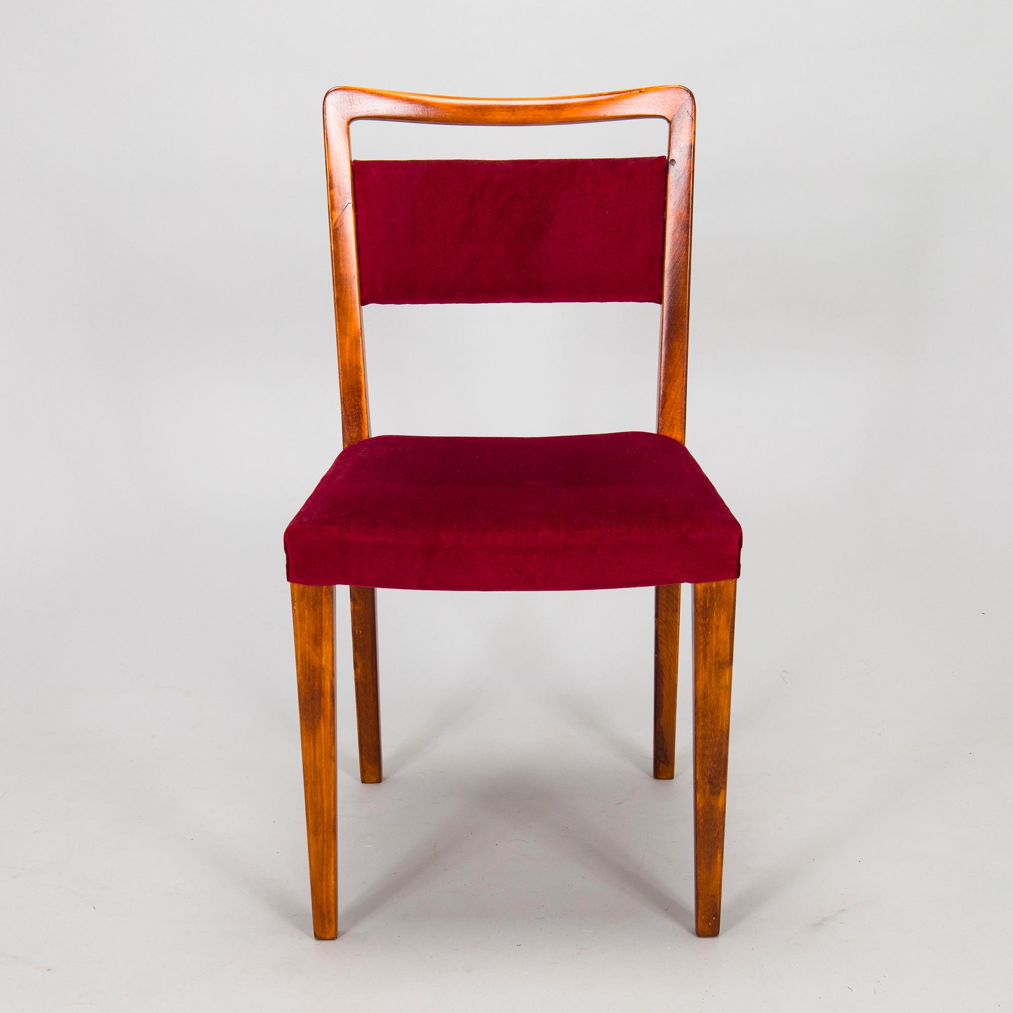 A mid 20th century dining table and a set of four chairs, Oy Boman Ab and two chairs Werner West.