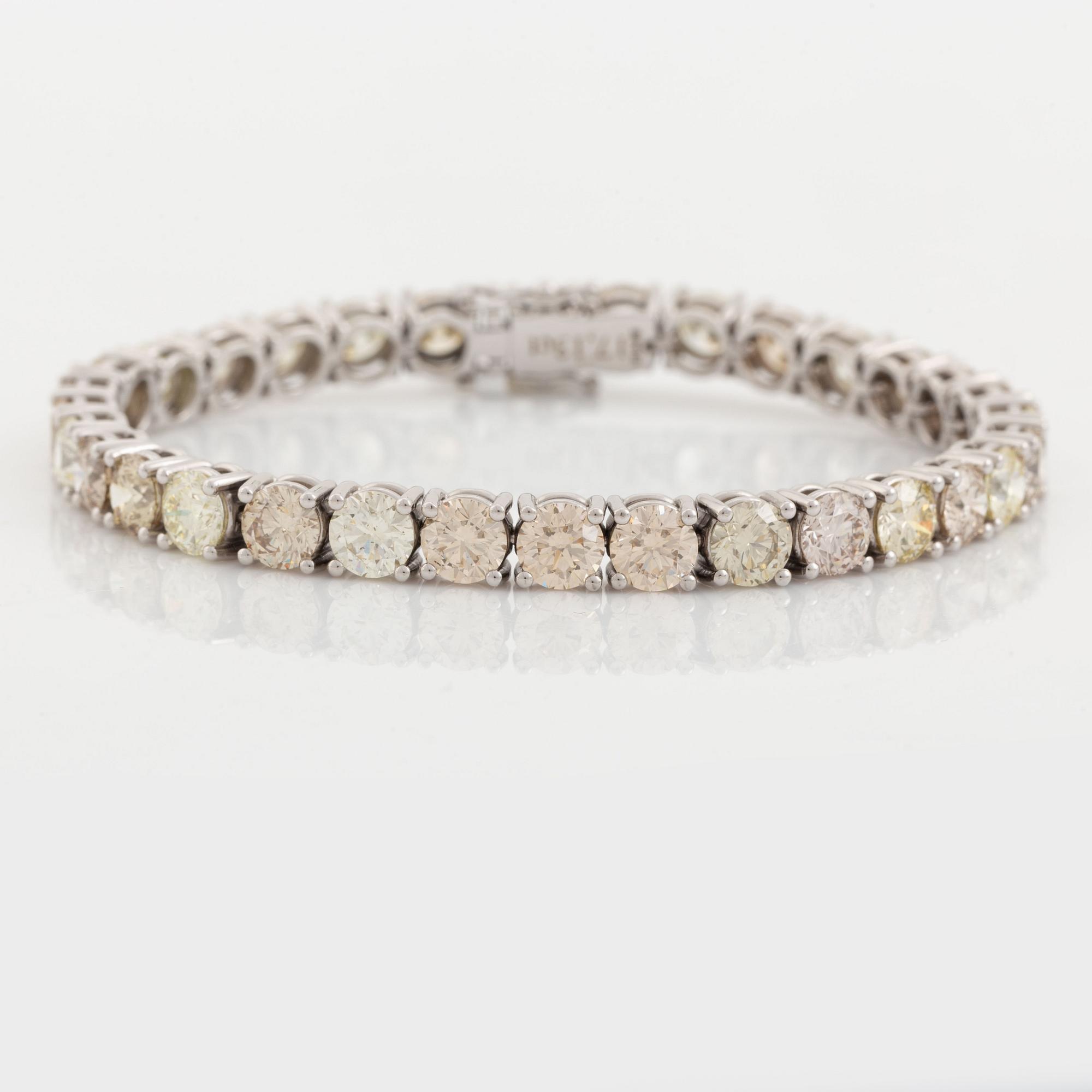 Round brilliant-cut diamond rivière bracelet, with IGI report.