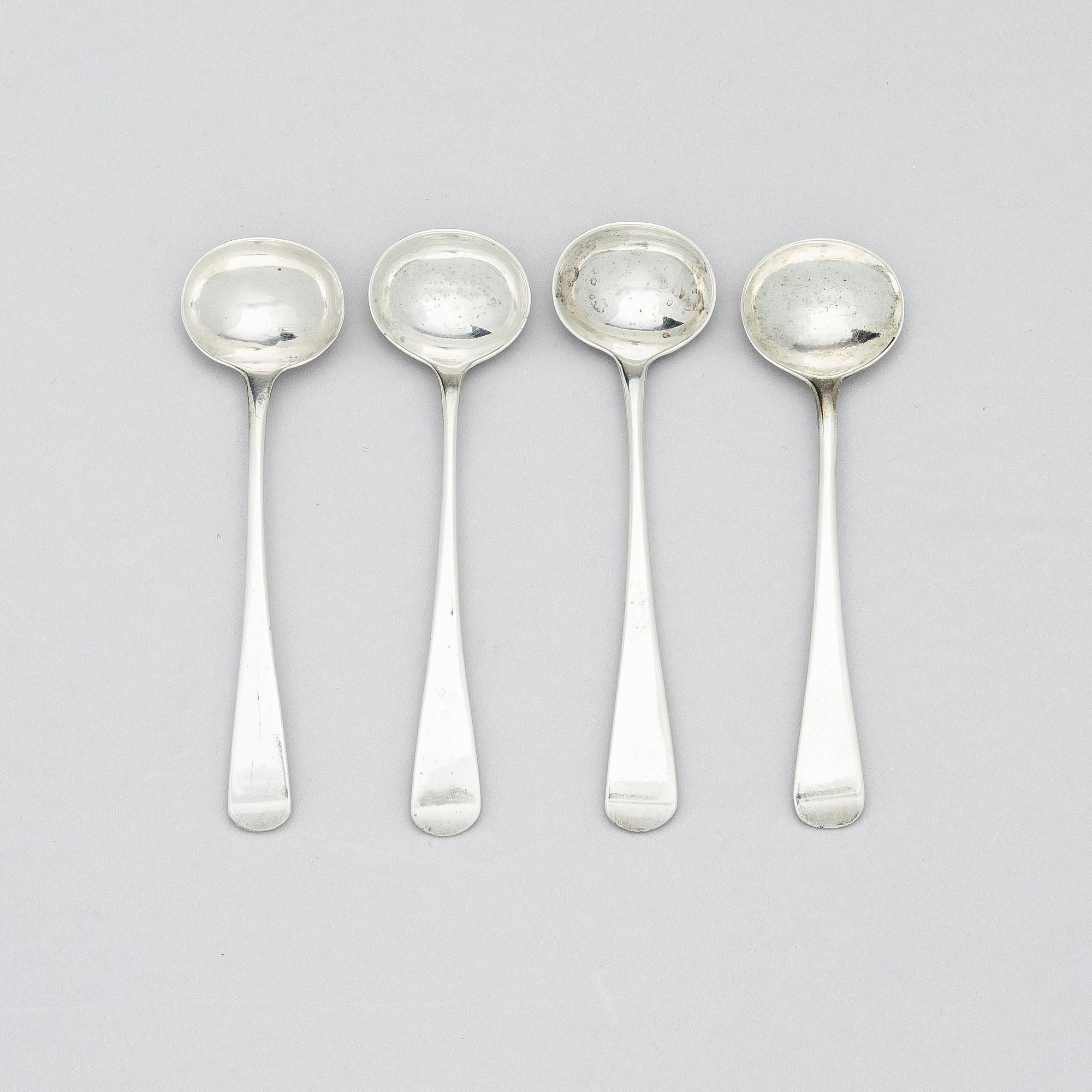 Four English 18th century silver salt-cellars, mark of William Fountain & Daniel Pontifax, London 1791, and spoons.