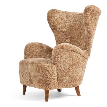 362. Otto Schulz, a Swedish Modern sheepskin upholstered armchair, Boet Gothenburg 1940s.