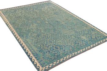 An Afghan kelim carpet, c. 293 x 214 cm.