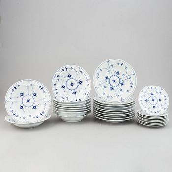 Royal Copenhagen, 29 pieces of 'Musselmalet Riflet' porcelain, Denmark.