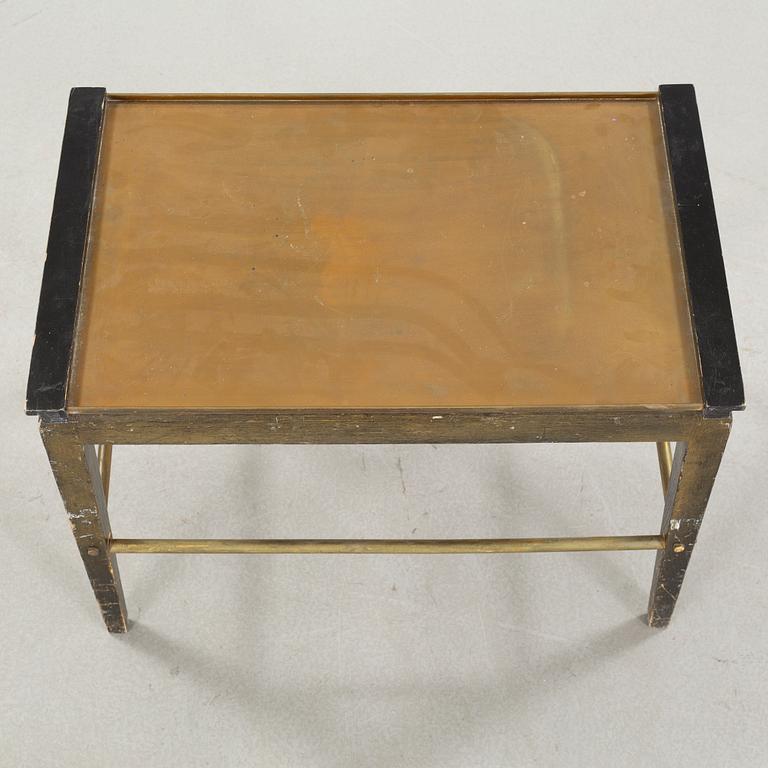 A tray table from the first half of the 20th century by Ystad Brons.