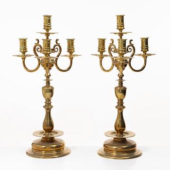 A pair of brass candelabras, Gusums Bruk, Sweden, around 1900.
