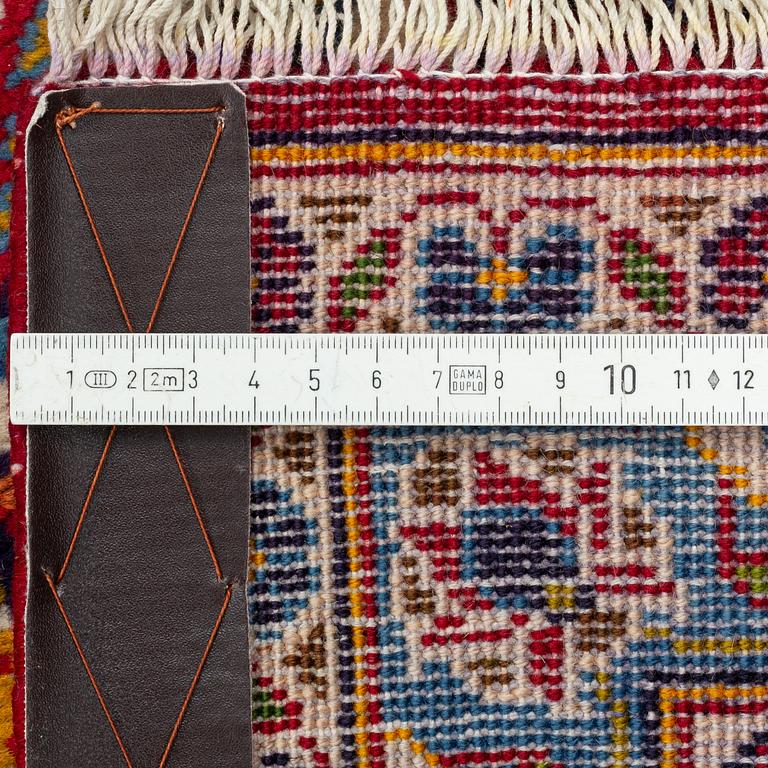A Keshan carpet, approximately 408 x 287 cm.