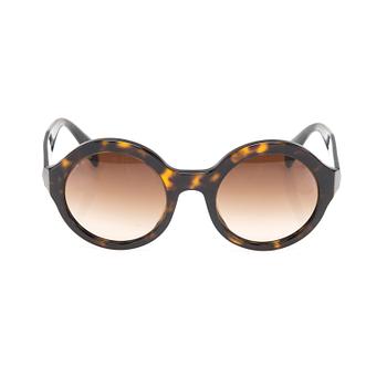 SOLGLASÖGON, Prada.