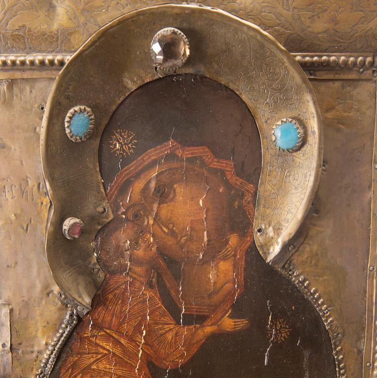 A 19th century Russian icon with brass risa.