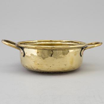 An 18th century brass colander.