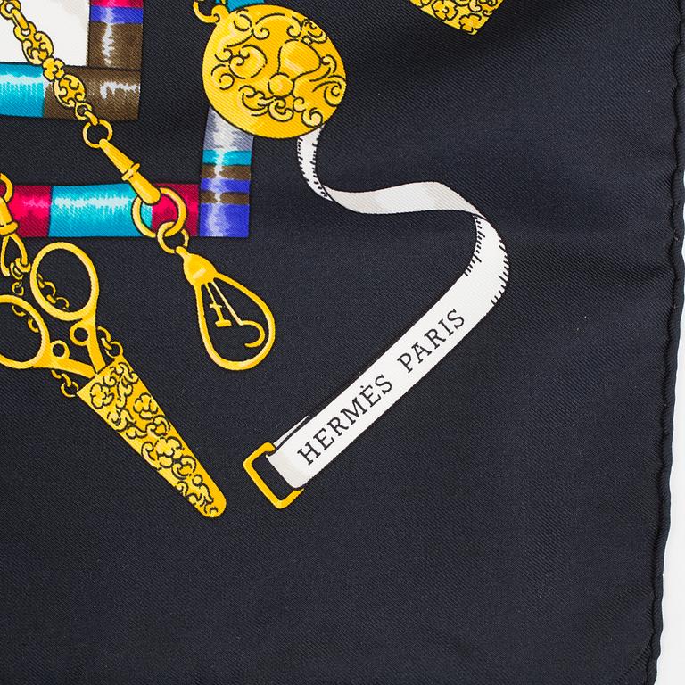 Silk scarf from Hermès in pattern "Petite main" designed by Caty Latham in 1987.