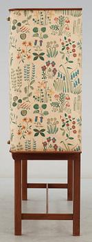 A Josef Frank mahogany cabinet, doors and sides covered in Frank's floral chintz fabric 'Fatima', Svenskt Tenn ca 1937.