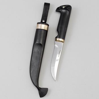 A Finnish puukko knife in leather sheath, for Fiskars, late 20th century.