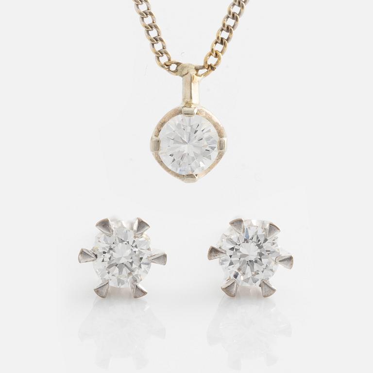 Earrings and pendant with brilliant-cut diamonds.