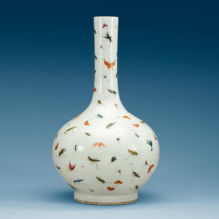 A Chinese butterfly and cricket vase.