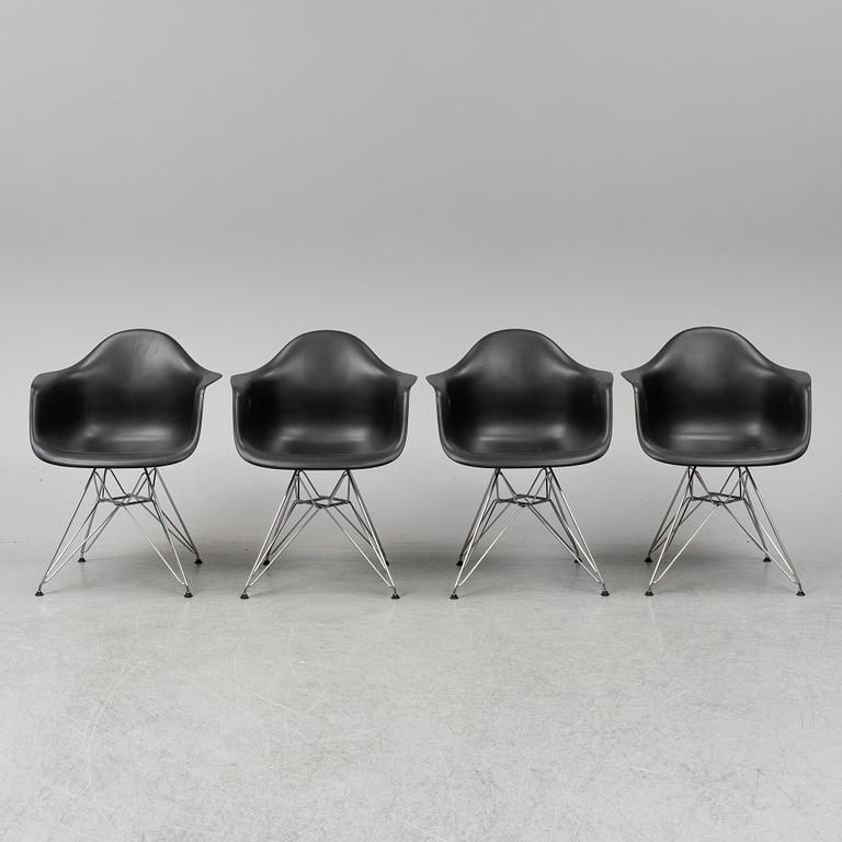 CHARLES AND RAY EAMES,  4  Eames Plastic Armchair, Vitra 2010.